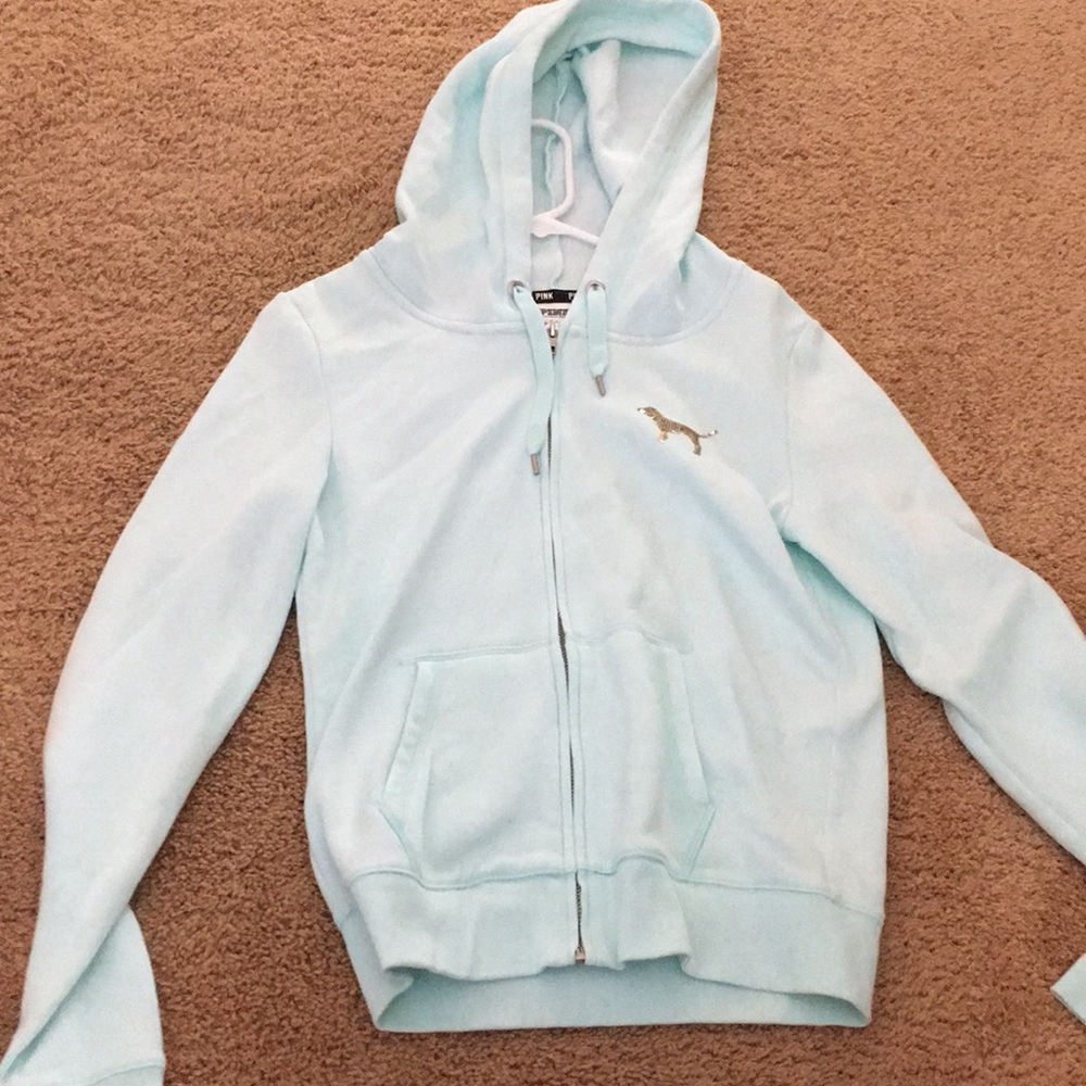 light blue sweatshirt w/ gold sequins